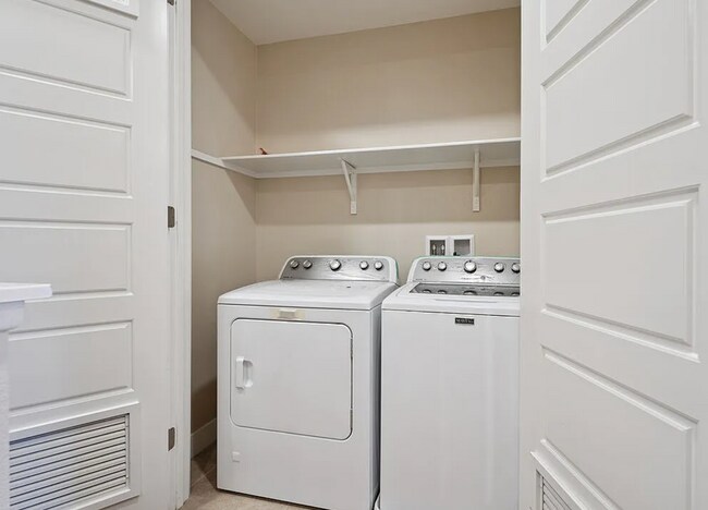 Building Photo - Tucked within the Hollywood Hills in a gated community
