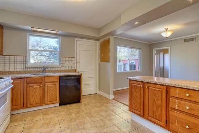Building Photo - Ranch, no stairs, 1-car garage, fenced yar...