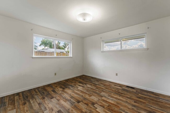 Building Photo - Charming 4-Bedroom Home with Spacious Yard in Rogers