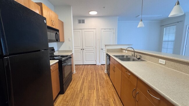 Primary Photo - Gated Community Condo Now Available! LOW C...