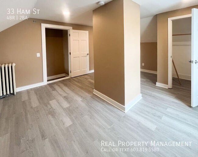 Building Photo - Spacious 4-Bedroom Apartment with Modern U...