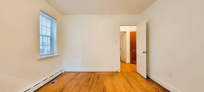 Building Photo - Remodeled brick bungalow with 1st floor li...