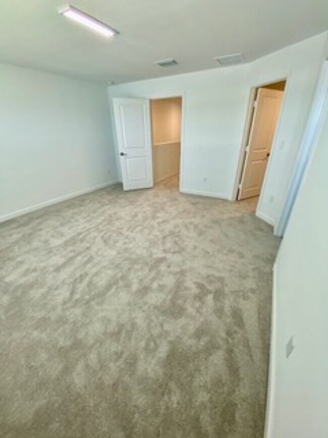 Building Photo - Brand new Townhome centrally located in La...