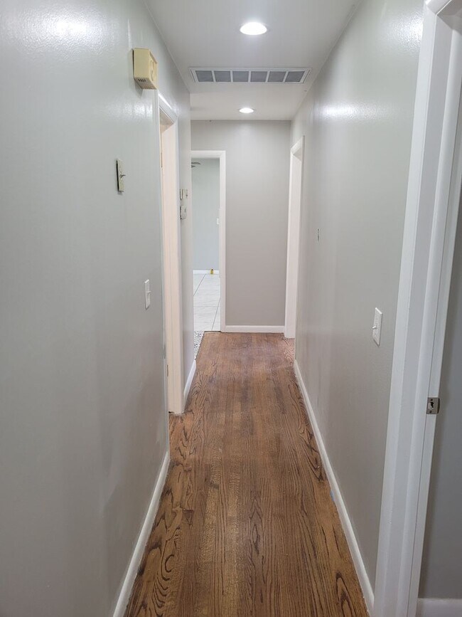 Building Photo - Remodeled 3 bedroom 2 bathroom house with 2 car garage and fenced yard