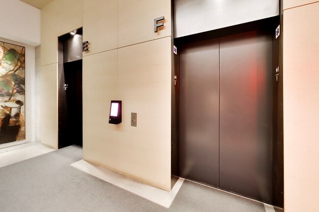 Building Photo - Urban Luxury at SoMa Serif Condos 2BR/2BA | In-Unit Laundry & 24-Hour Security