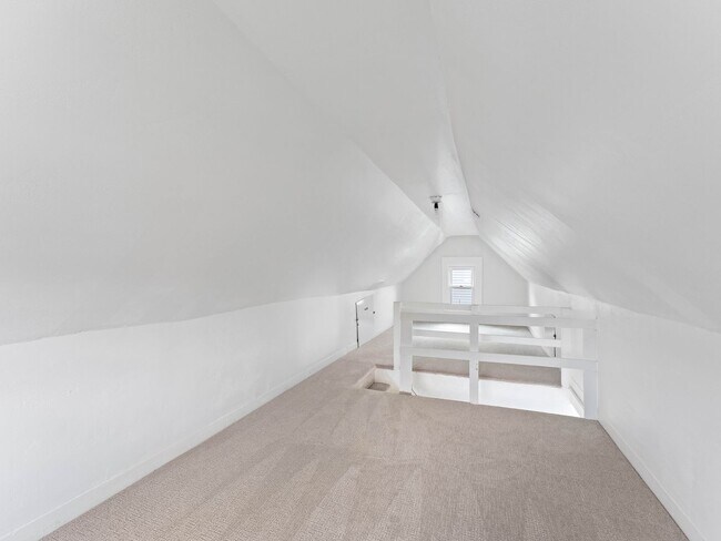 Building Photo - Renovated 3-Bedroom Apartment with Bonus Finished Attic & Spacious Shared Backyard