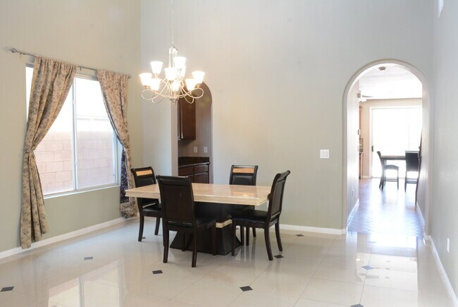 Building Photo - "Spacious 4-Bedroom Oasis with Granite Tou...