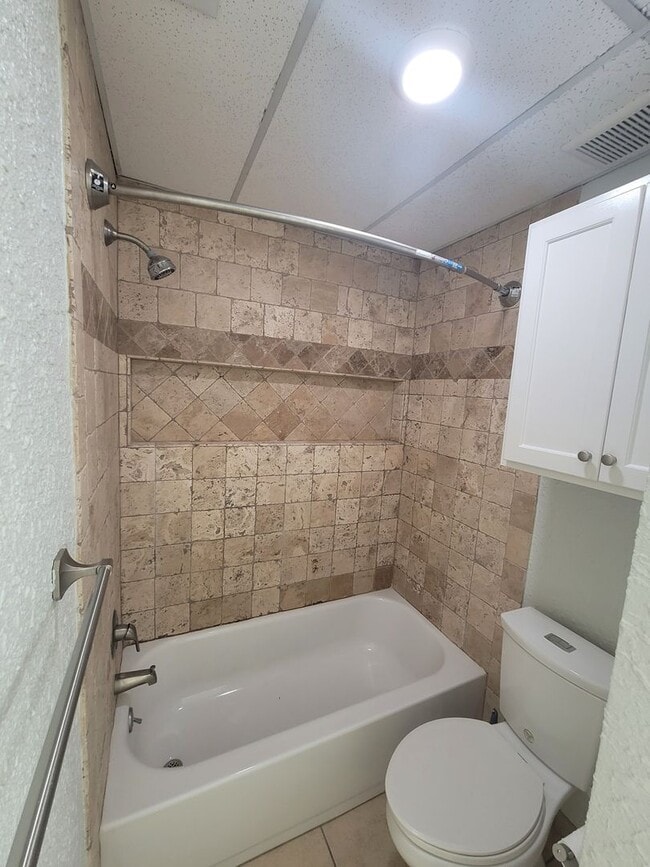 Building Photo - 7079 N Holiday