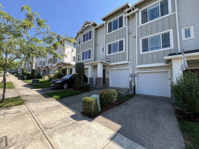 Building Photo - Spacious Bull Mountain Townhome Featuring Two Ensuite Bedrooms, Attached Garage & Modern Finishes &