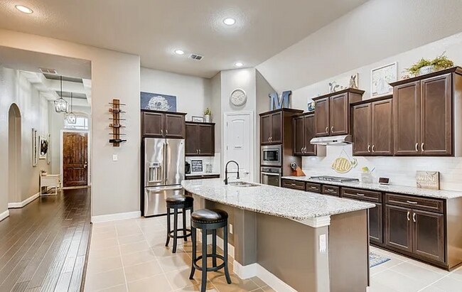 Building Photo - Spacious 4-Bedroom Ranch-Style Rental with...