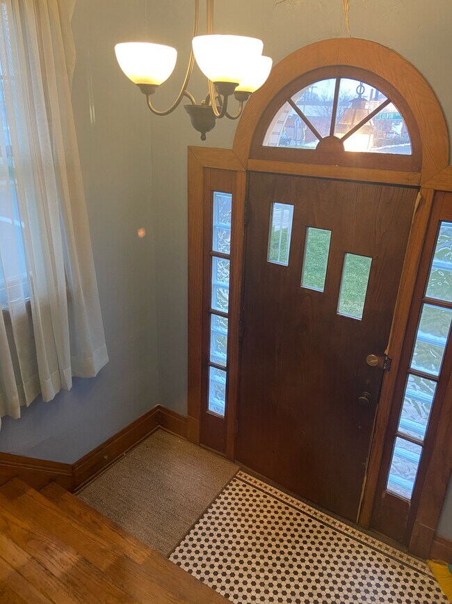 Front entry to living room area - 679 Colvin Blvd