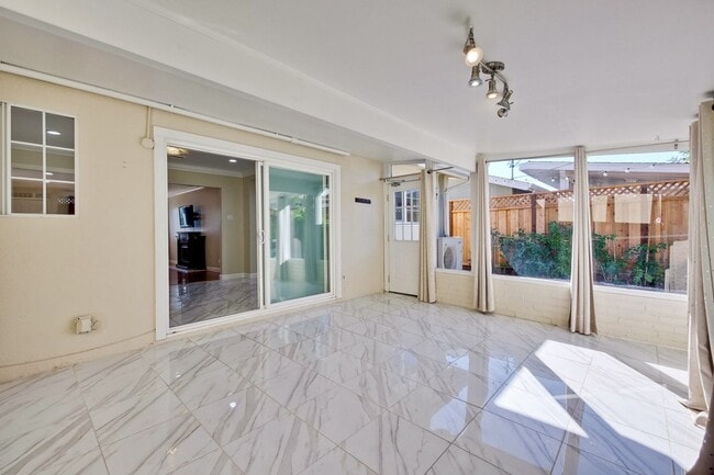 Building Photo - Turnkey Home with Natural Light & Upgrades...