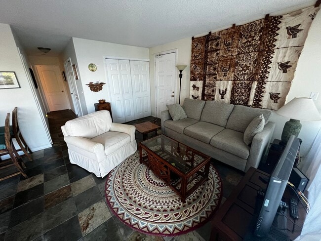 Building Photo - Furnished 2 bedroom 2 bath condo with assigned parking stalls