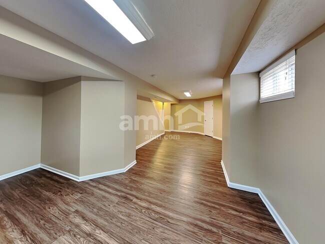 Building Photo - 6312 Satin Wood Dr