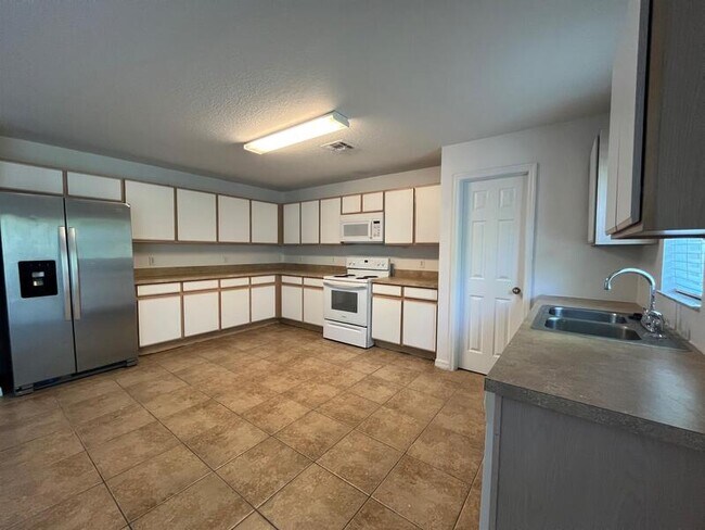 Building Photo - 15630 Sarcee Ct