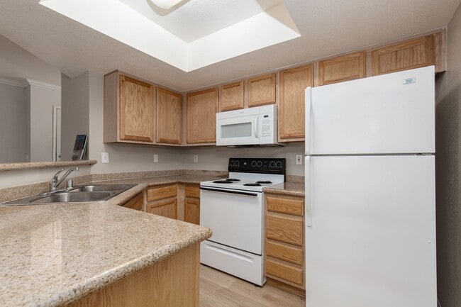 Building Photo - Remodeled first floor unit in gated commun...
