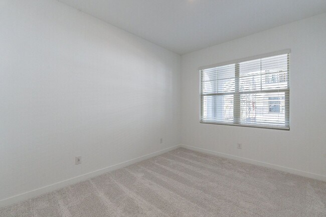 Building Photo - 2024 Luxury Townhome | 2-Car Garage, Quartz Kitchen & Resort Pool