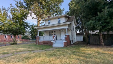 Building Photo - Welcome to this newly renovated gem locate...