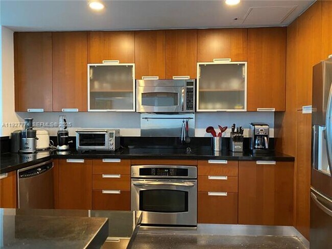 Building Photo - 7901 Hispanola Ave