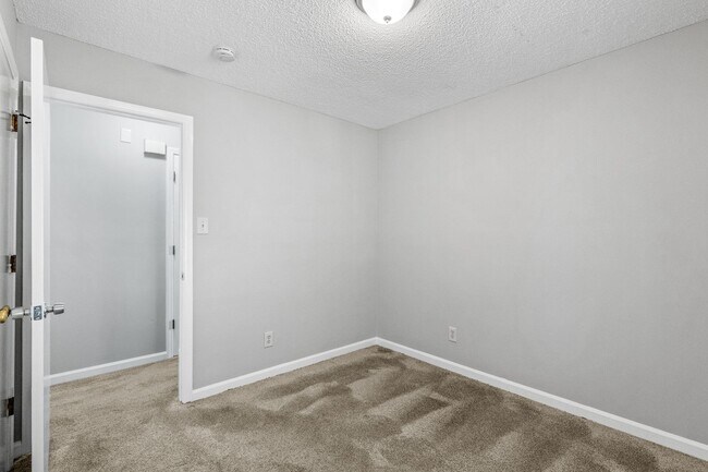 Building Photo - NE Home - Updated Kitchen and Bathrooms!  SS Appliances, Fire Place, Front Porch & Deck, Fenced Y...