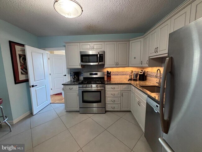 Building Photo - 5225 Pooks Hill Rd