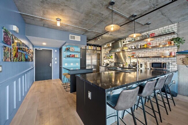 Building Photo - Chic Furnished Loft with Bay Views in the ...