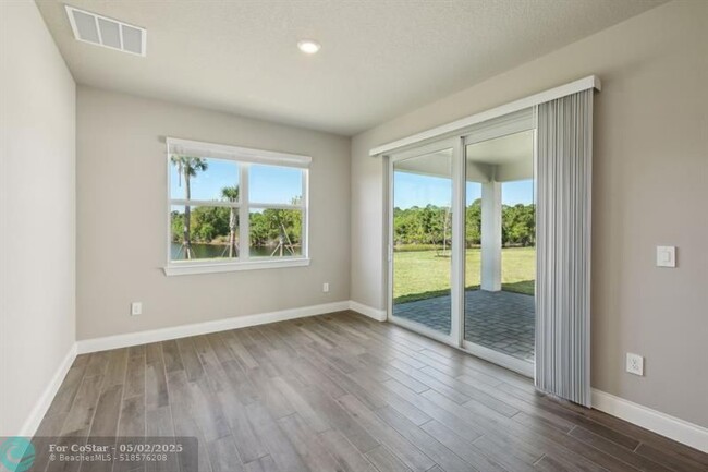 Building Photo - 9041 Dahlia Cir