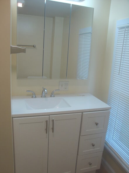 Bathroom vanity and medicine cabinet. - 351 W Currant St