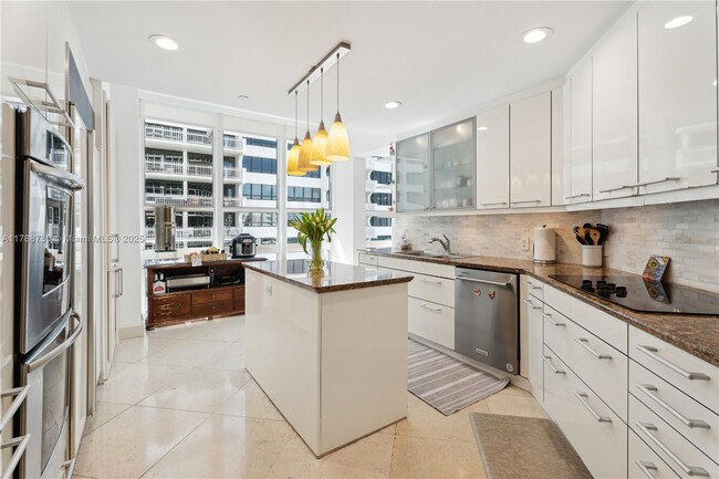 Building Photo - 10225 Collins Ave