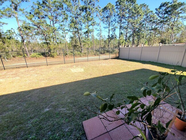 Building Photo - Corner Lot 4/2 Home - Fenced Yard - Near NAS