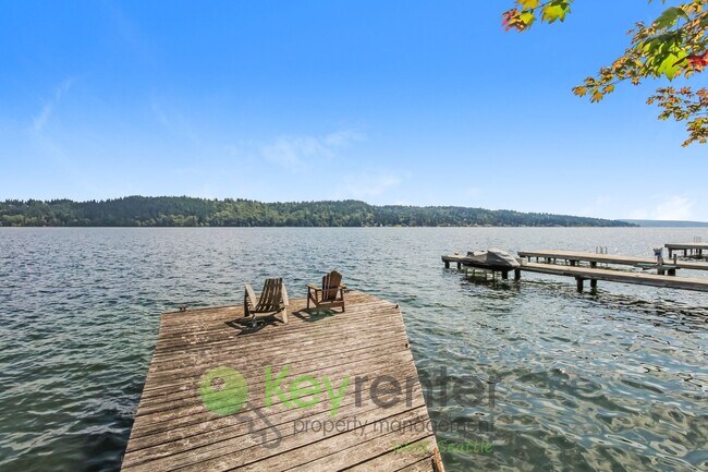 Building Photo - Waterfront Elegance with Private Dock and Designer Finishes