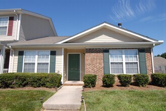 Building Photo - Charming 3 bedroom 2 bath Townhouse w/ fenced in yard located off Guilford College Road!