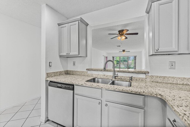 Building Photo - 5710 Princess Palm Ct