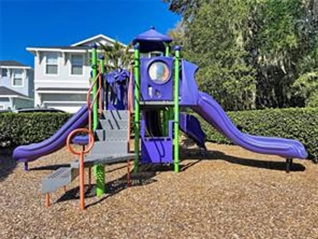 Building Photo - Water Front Home- 4 Large Bedrooms-3 baths Gated Community Call Sheila Campbell 407-687-7900
