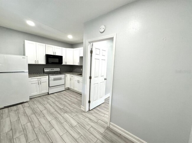 Building Photo - 1411 E 24th Ave