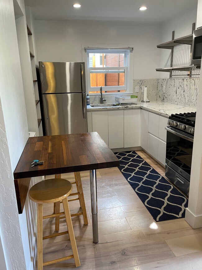 Kichen and small siting area - 1038 Pardee St