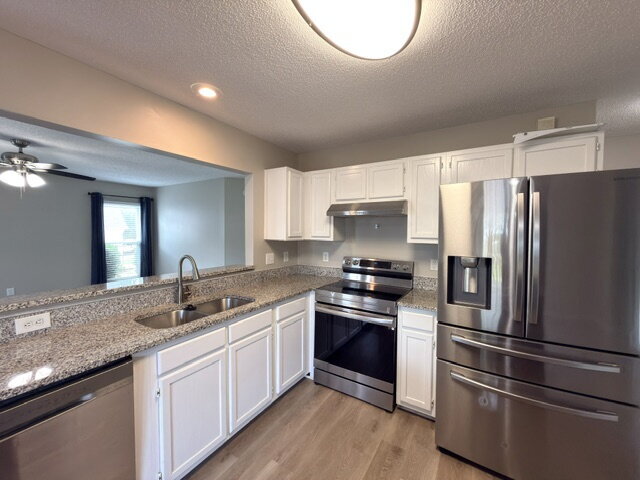 Building Photo - Spacious 4BR Home with Fenced Yard, Community Pool & 2-Car Garage