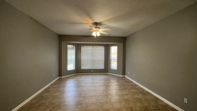 Building Photo - Spacious 4/3.5 Pool Home with Water View & 3-Car Garage in Lee Vista Area (close to Lake Nona)