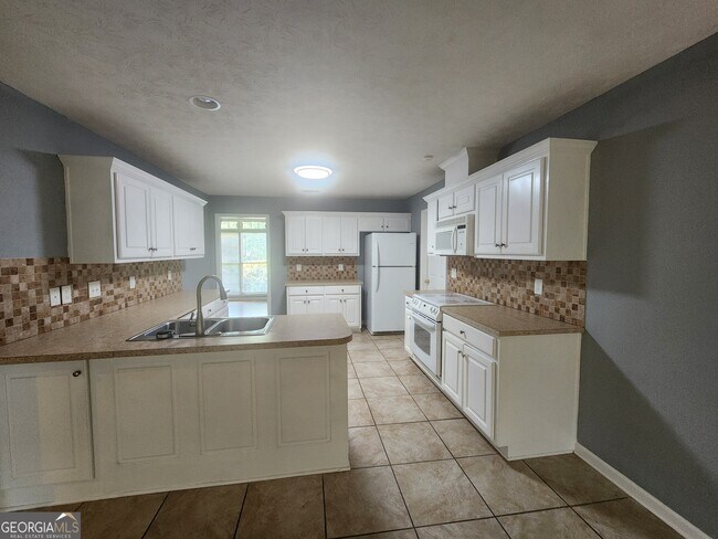 Building Photo - 7168 Village Loop