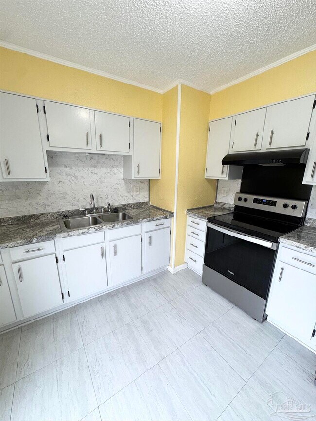 Building Photo - 6320 Denver Ave