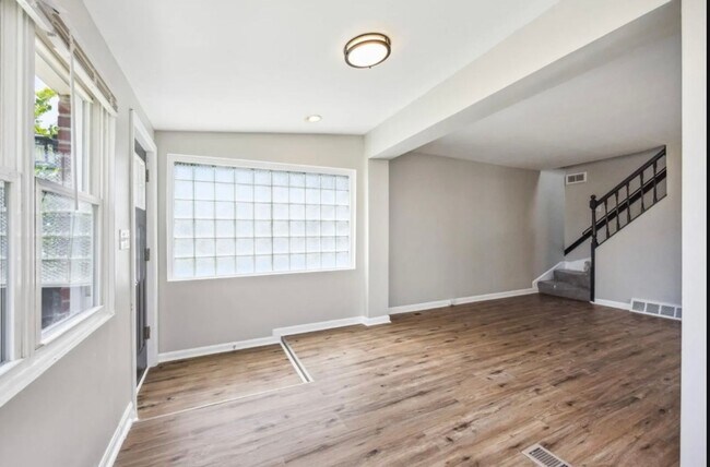 Building Photo - Fully Renovated Two-Bedroom Townhome In Du...