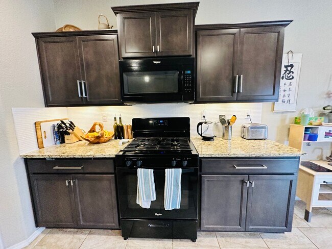 Building Photo - STUNNING Back yard!  Level II EV Charger!