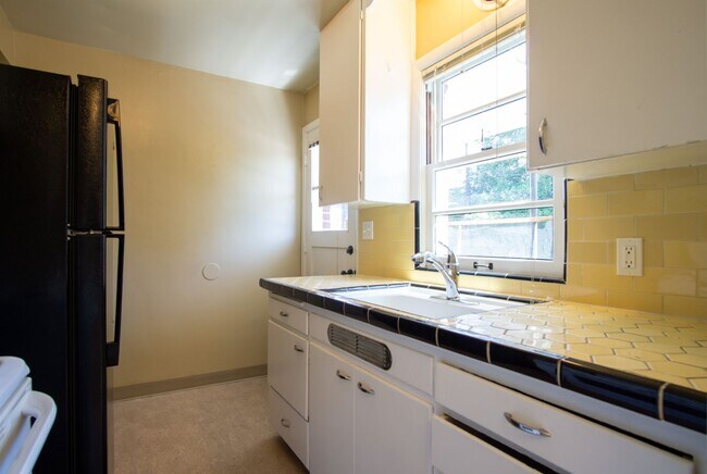 Building Photo - In the Heart of NW-Mid-Century 2Bdr Lives ...
