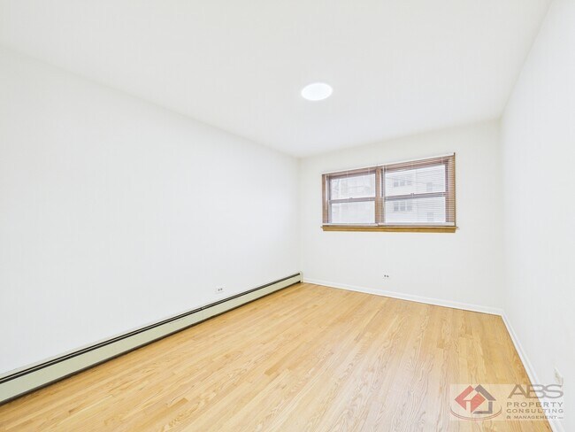 Building Photo - 11219 S Martin Luther King Dr