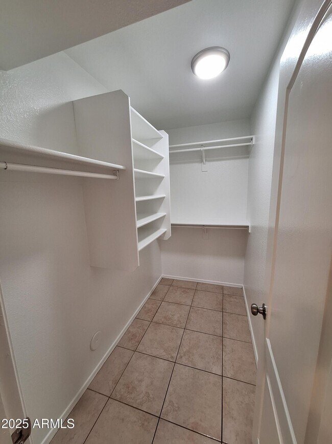 Building Photo - 9345 E Onza Ave