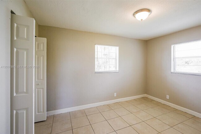 Building Photo - 5980 NW 24th Ct