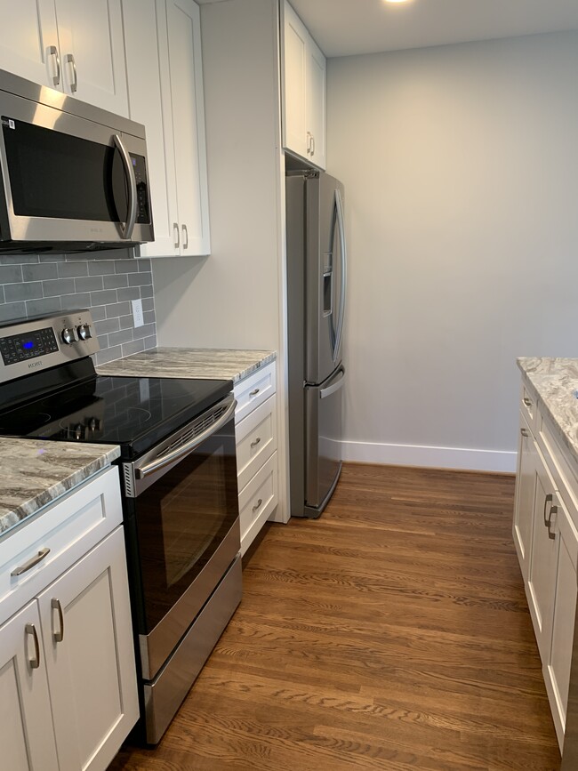 All new granite countertops. Stainless steel appliances. - 3509 Sargeant Dr