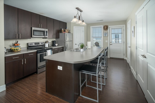 Model Kitchen - The Avenue at Orono Apartments