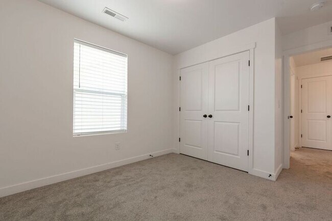 Building Photo - Beautiful Row End Townhouse w 2 car attached