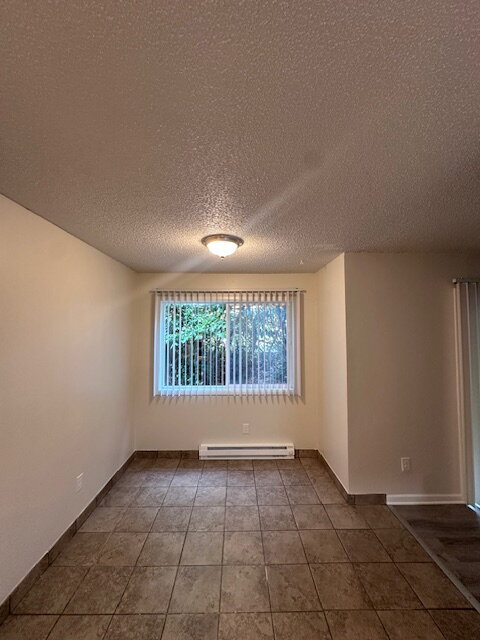 Building Photo - Charming Downstairs 2-Bed Oasis with Full Bath on SE Division - 836 Sq. Ft. of Portland Comfort!